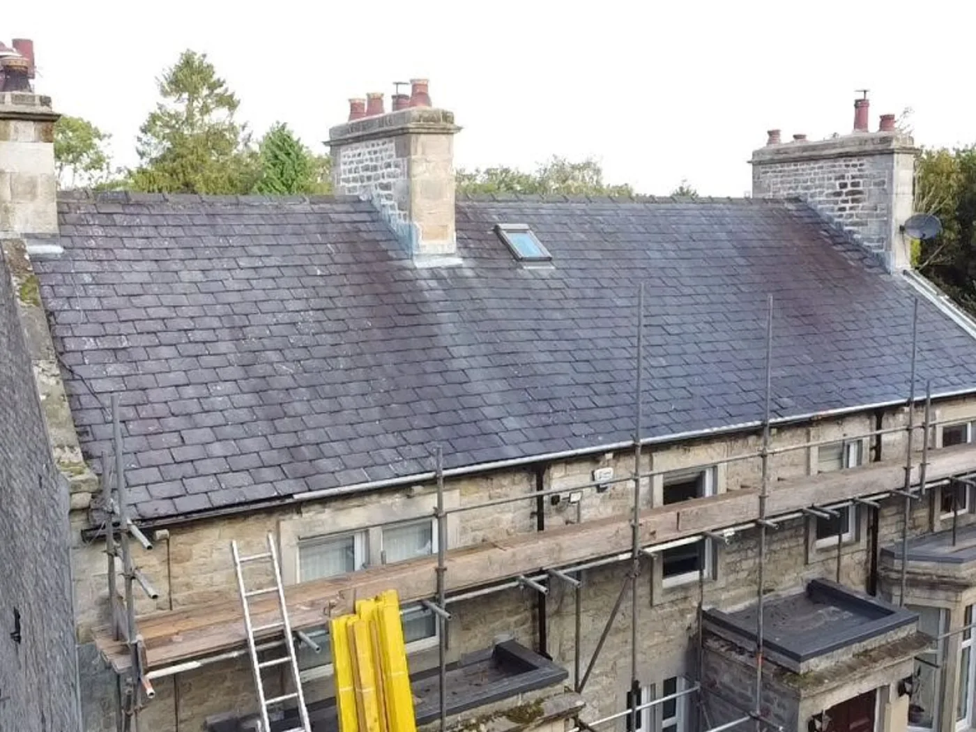 Scaffolded slate roof terrace