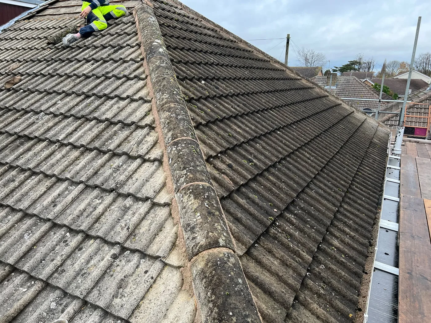 Roofer working on a tiled roof
