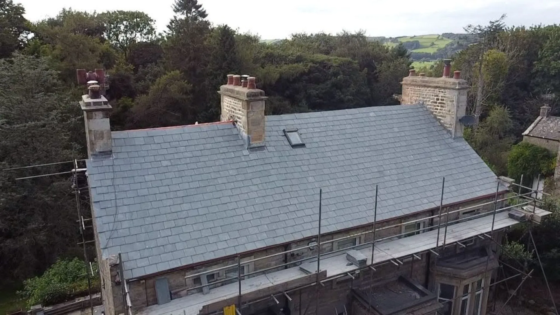 A newly laid slate roof by Crest Roofing & Cladding